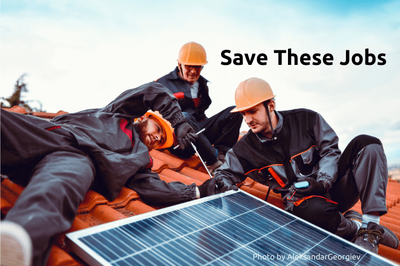 Thee works installing a solar panel on a rooftop. Governor DeSantis veto Net Metering bill.