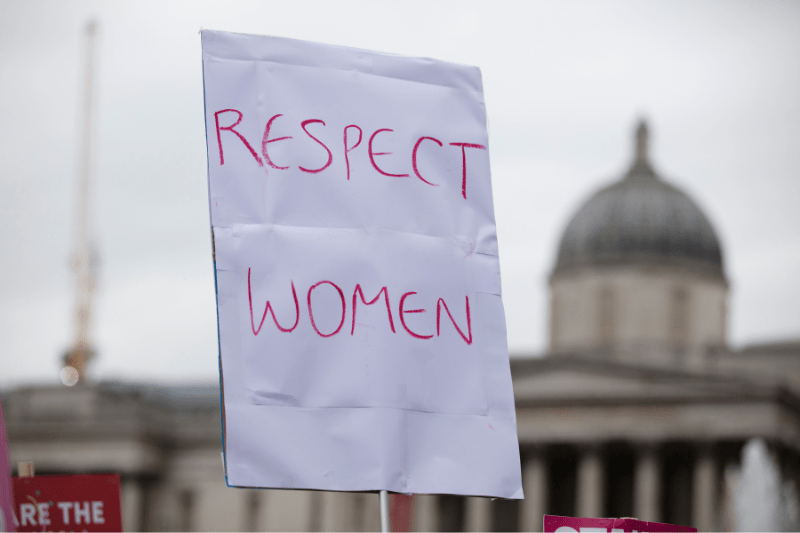 Respect women sign at a rally in front of the Capitol.