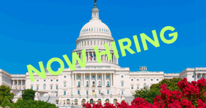 "Now Hiring"superimposed over U.S. Capitol.