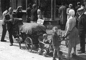 Ethnic Germans being kicked of Czechoslovakia.