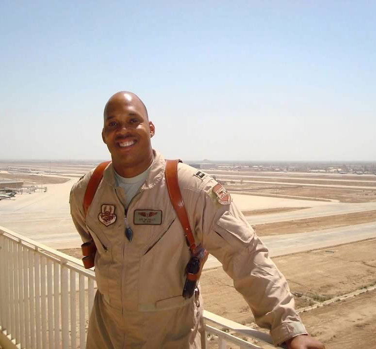 COL Dr. Darren McAuley in flight suit.